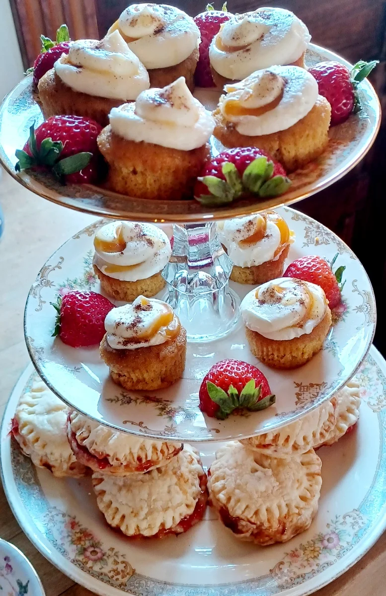 Tier of Fall baked goods, pumpkin cupcakes, caramel apple cupcakes